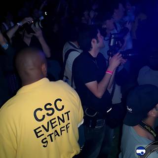 Yellow-Shirted Man in the Midst of the Club Crowd