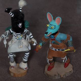 Two Native American Figurines