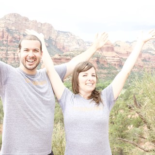 Joyful Couple Celebrating Atop Sedona Red Rocks