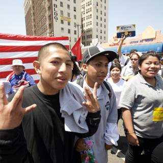 Mayday Rally Participants Wave American Flag