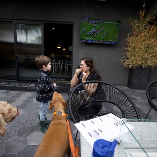 Family Time with Dogs at Modern Outdoor Patio