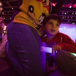 Child and Mascot at Baby Rave Event