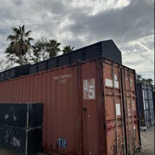 Containers Under Cloudy Skies