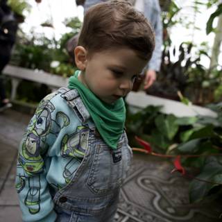 Childhood Wonder in Greenhouse Splendor