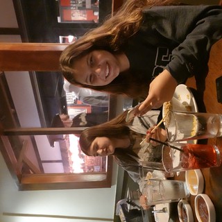 Friends Enjoying Asian Dinner Together
