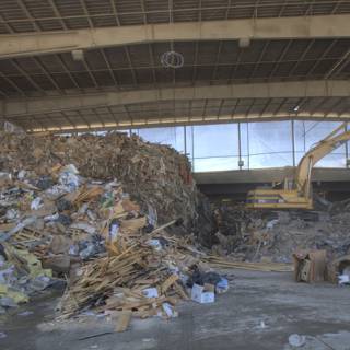Garbage Pile in Warehouse with Bulldozer