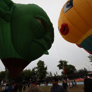 Giant Character Balloons Face Off at Festival
