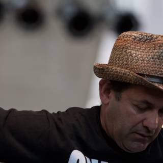 Hatted Man at Ozomatli Performance
