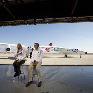 Branson and Rutan Discuss White Knight Two in Front of Airplane