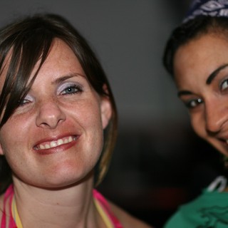 Two Smiling Women Sharing a Joyful Moment