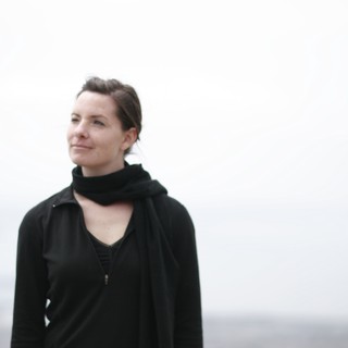 Contemplative Portrait by Misty Coastal Waters