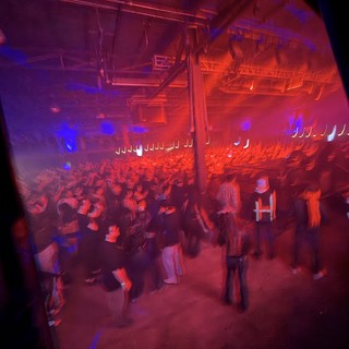 Red and Blue Lit Concert Crowd from Above