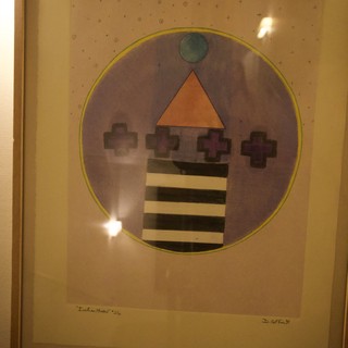 Geometric Abstract Artwork with Circle and Striped Vase