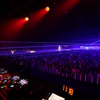 Laser Light Spectacle Over Pulsing Festival Crowd
