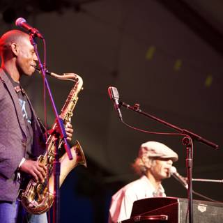 Saxophonist and Accompanist Perform for Crowds at 2010 Cochella