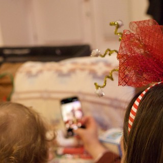Children Watching Christmas Holiday Video Together