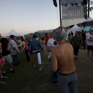 Shirtless Richard Stearman enjoying Coachella