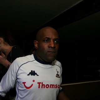 Man in Tottenham Hotspur Jersey at Nightclub Event