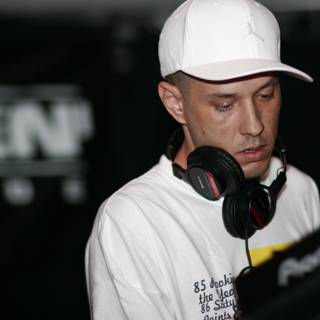 DJ S in his Classic White Cap and Headphones