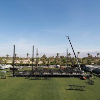 Stage set up in the middle of a grassy field