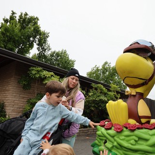 Children Marvel at Woodstock Balloon Float Decoration