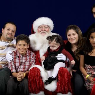 A Family's Festive Photo Opportunity with Santa Claus