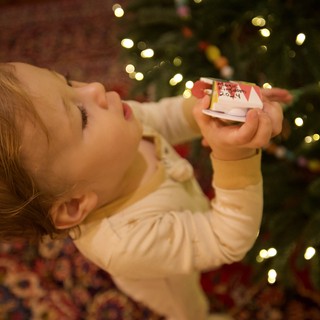 Child's Wonder at Christmas Morning Gift Opening
