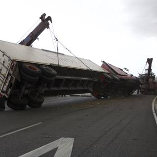 Overturned Truck on Tarmac Road
