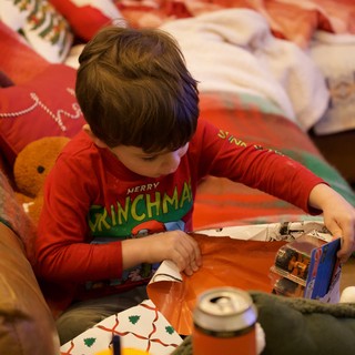 Christmas Morning Gift Opening with Young Child