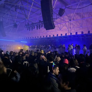 Electronic Music Event with Purple Stage Lighting