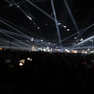 Laser Light Storm Over Massive Festival Crowd