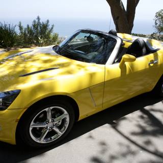 Sleek Yellow Sports Car on the Roadside
