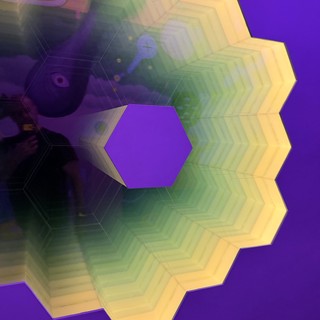 Rainbow Hexagonal Light Installation Against Purple Wall