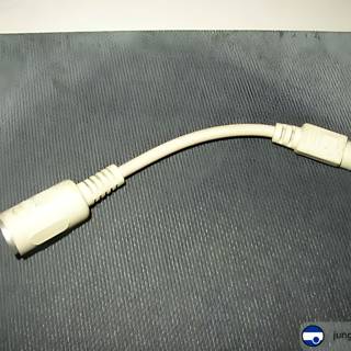 White Cord Connected to Computer