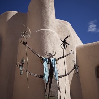Southwestern Adobe Architecture with Ceremonial Skull Decoration