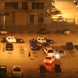 Parking Lot Scene with Police Presence