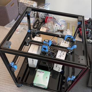 Metal-Framed 3D Printer with Blue Handle