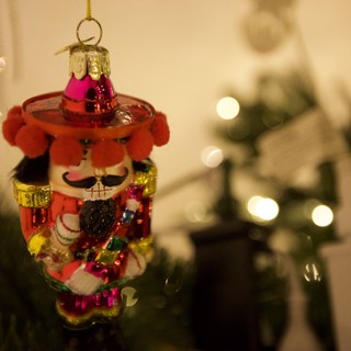 Colorful Nutcracker Christmas Tree Ornament with Bokeh Lights