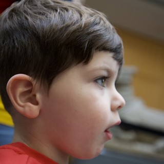 Young Boy in Profile at Baby Rave Event