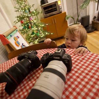 Young Child Discovers Photography Gear at Christmas