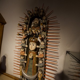 Traditional Folk Art Religious Sculpture with Radiating Halo