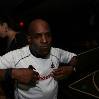 Tottenham Fan Commands Attention at Nightclub Event