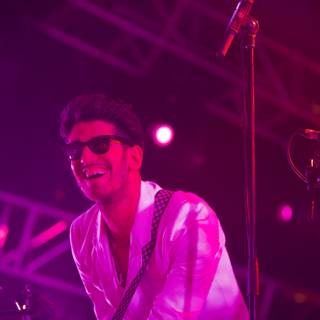 Smiling Musician in Sunglasses at Coachella