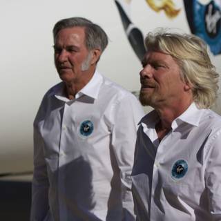 Branson and Rutan in White Shirts by Their Airplane