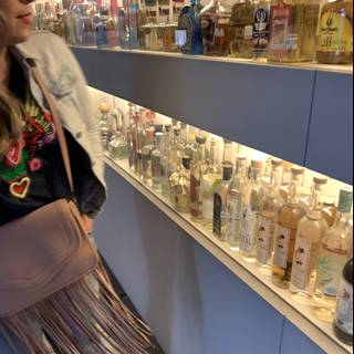 A Woman and her Liquor Shelf