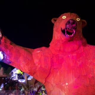 Glowing Bear Statue in the Night Sky