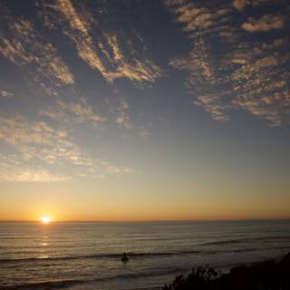 Golden Horizon: The Sun Sets over Halfmoon Bay