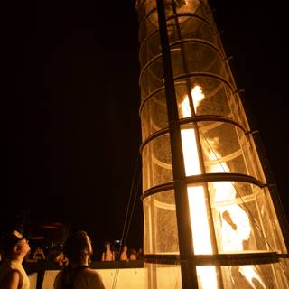 Towering Flames at Night