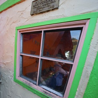 Historic Pinocchio Window with Green Trim at Fantasyland