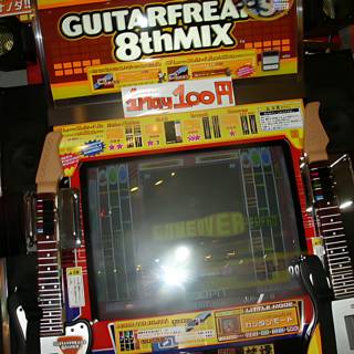 Jamming to the Beat: Guitar Freaks 8 Arcade Game Machine